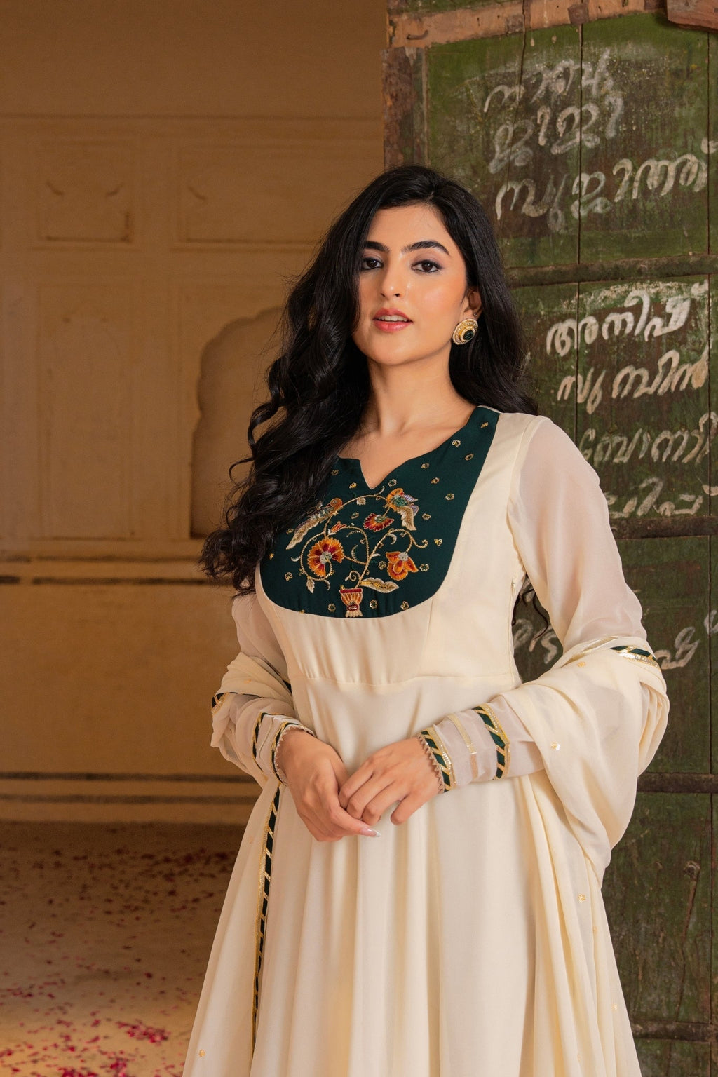 Royal Ivory Flow Anarkali Featuring Emerald Hand Embroidered Detail